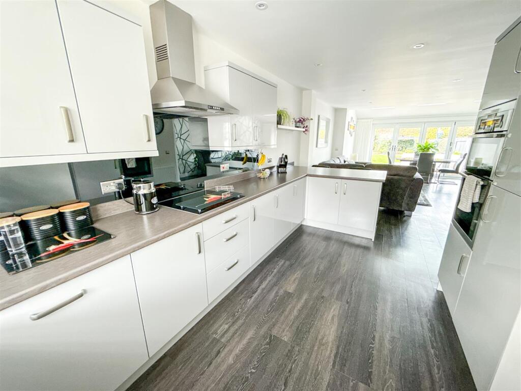 ALTERNATE VIEW OF KITCHEN AREA