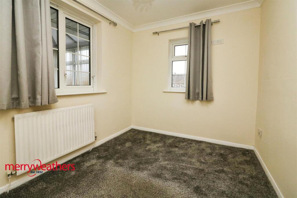 REAR BEDROOM
