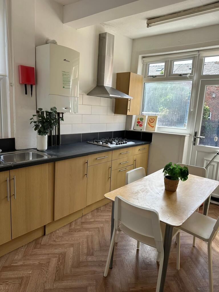 A bright and well-maintained kitchen featuring ...