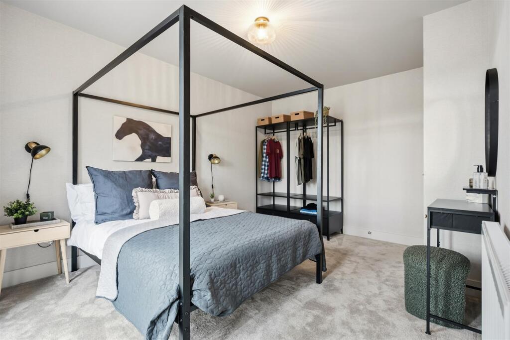 Bedroom One - bed and wardrobe.jpg