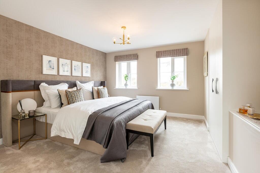 Large scale bedroom 1 looks out to the front