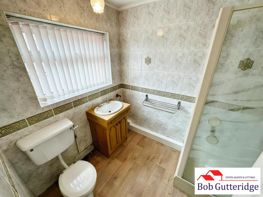 FULLY TILED SHOWER ROOM