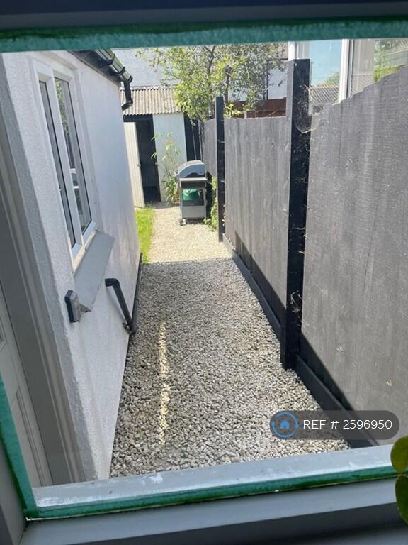 Back Door Leading To Fenced Rear Garden