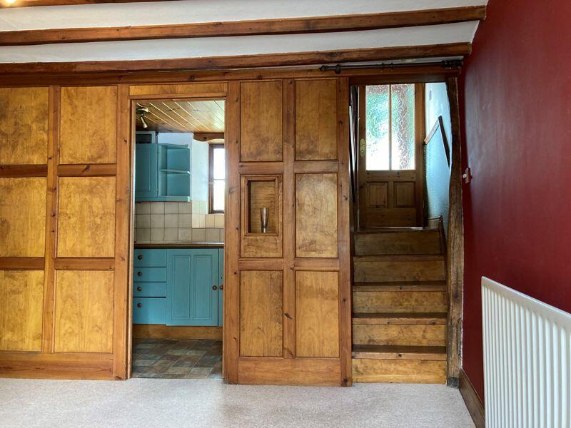 From lounge into kitchen with back door