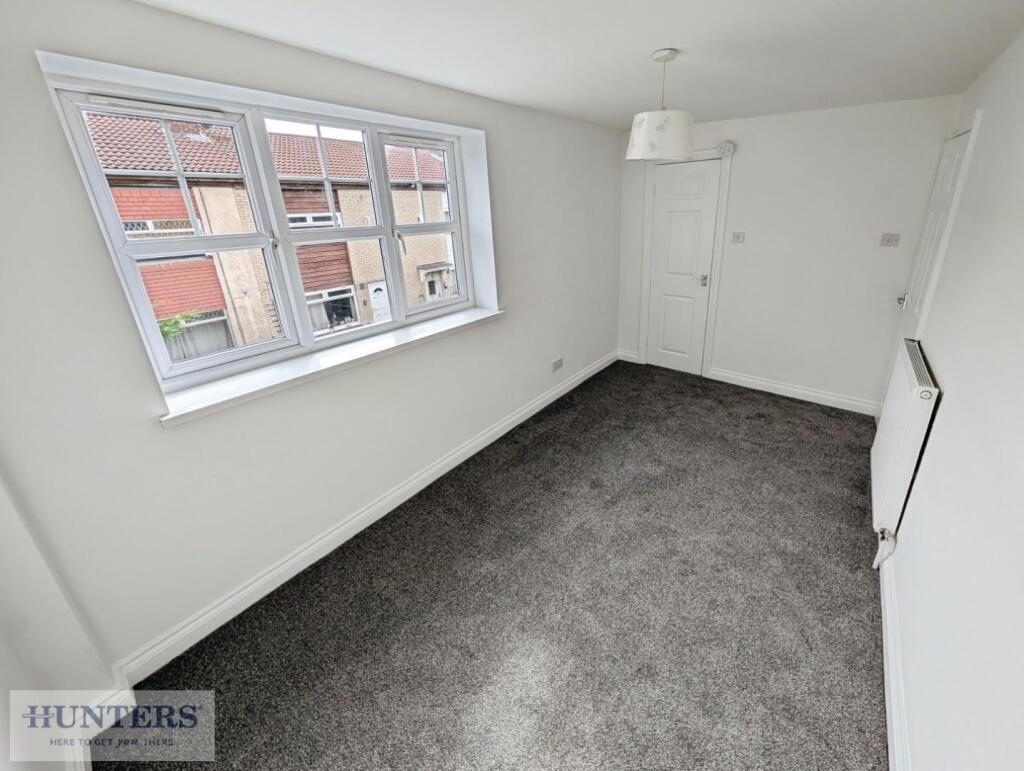 SECOND BEDROOM