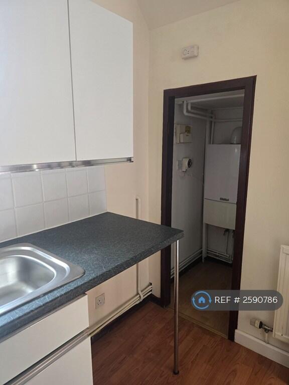 Kitchen View To Storage