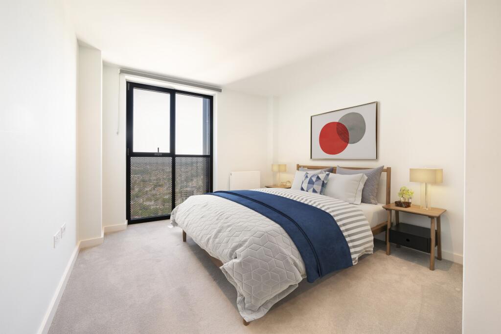 Experience tranquility in this elegantly designed bedroom retreat.