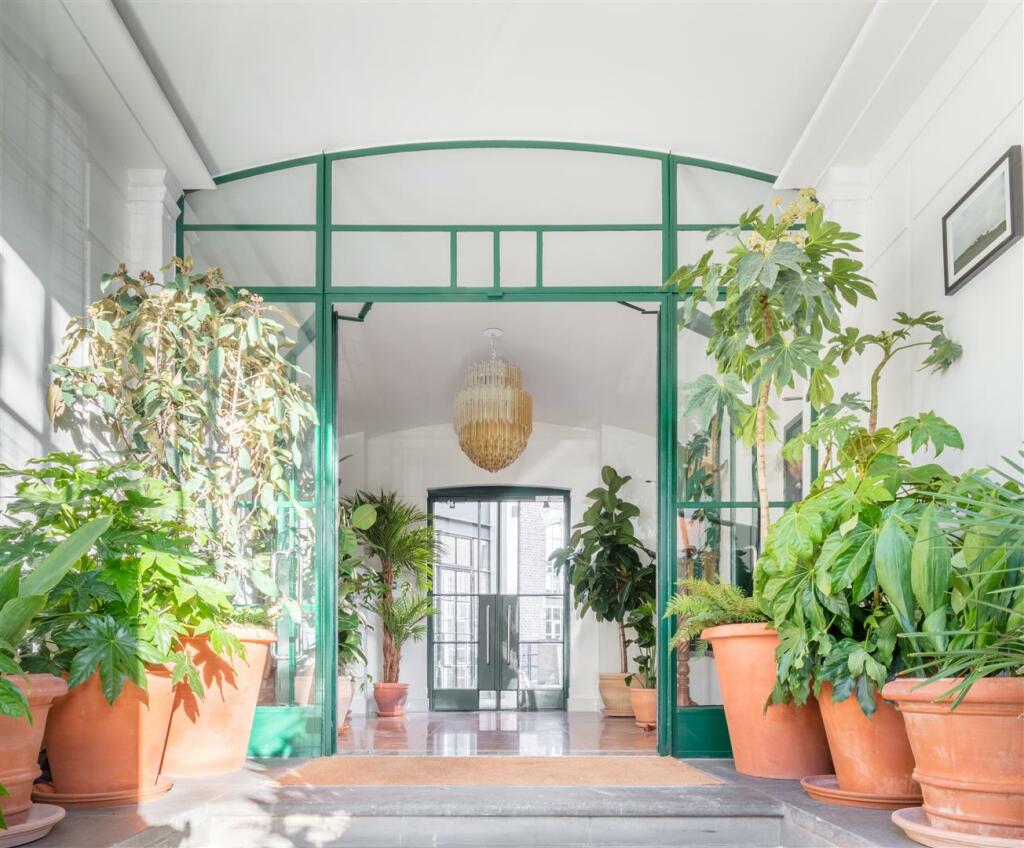 Plant-filled entrance hall