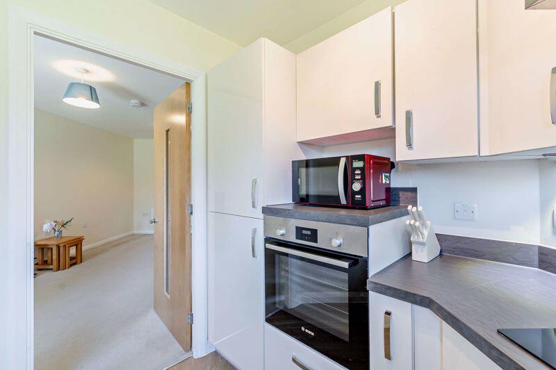 Kitchen through to Living Room