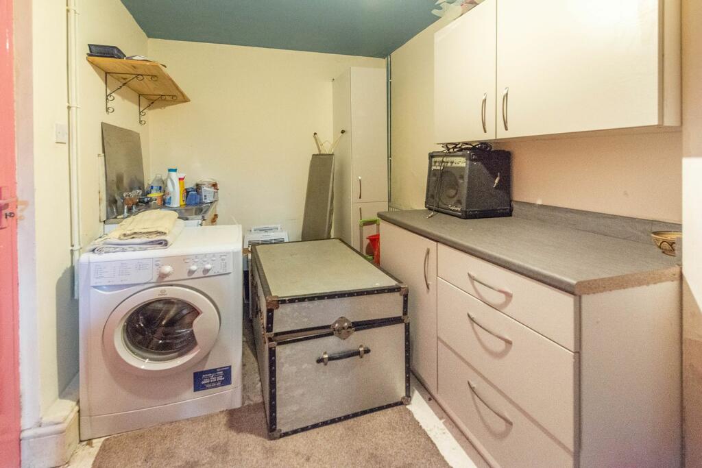 GROUND FLOOR CONVERTED GARAGE AND UTILITY ROOM