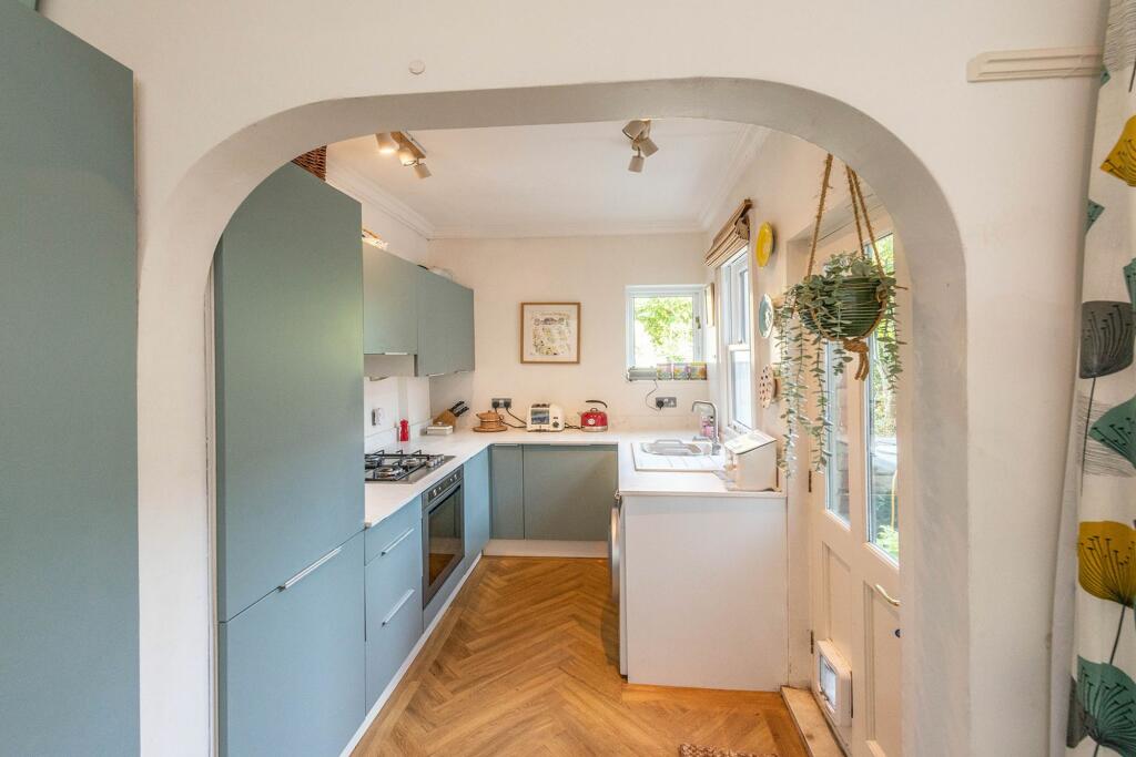 SITTING ROOM DINING ROOM AND KITCHEN