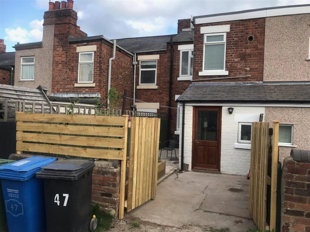 Rear garden - (ll supplied)