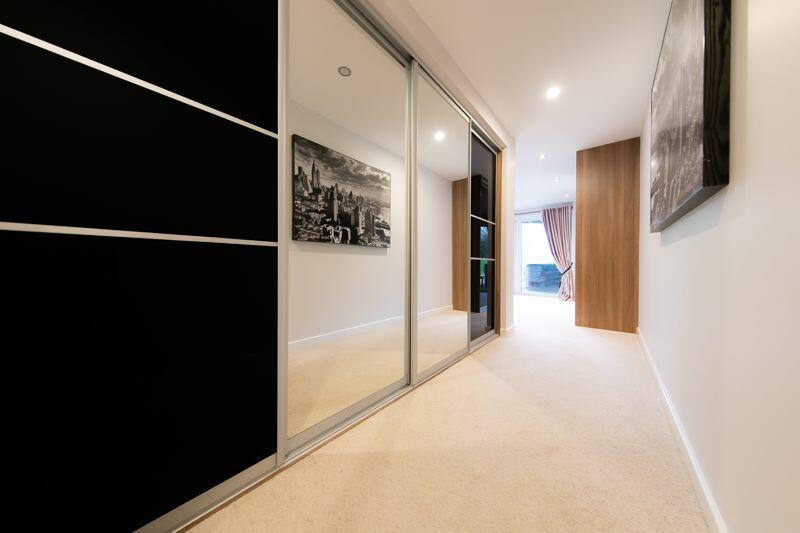 Master bedroom walk through wardrobe