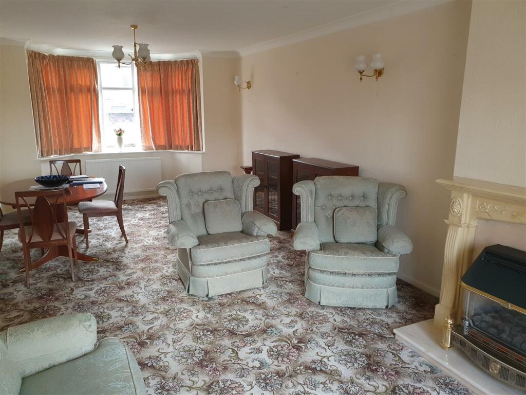THROUGH LOUNGE/DINING ROOM