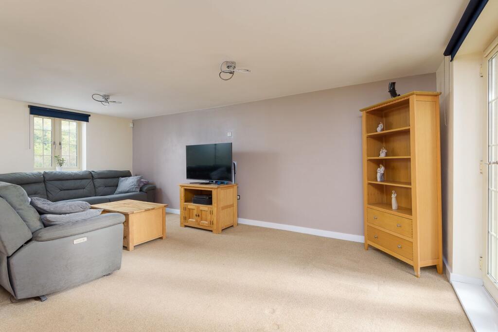 SITTING ROOM AND KITCHEN