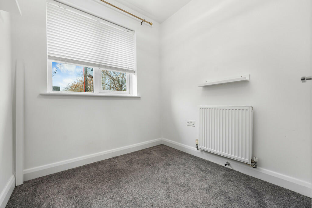 small bedroom wit...