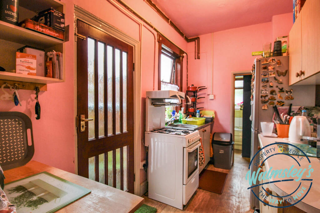 Kitchen through to bathroom