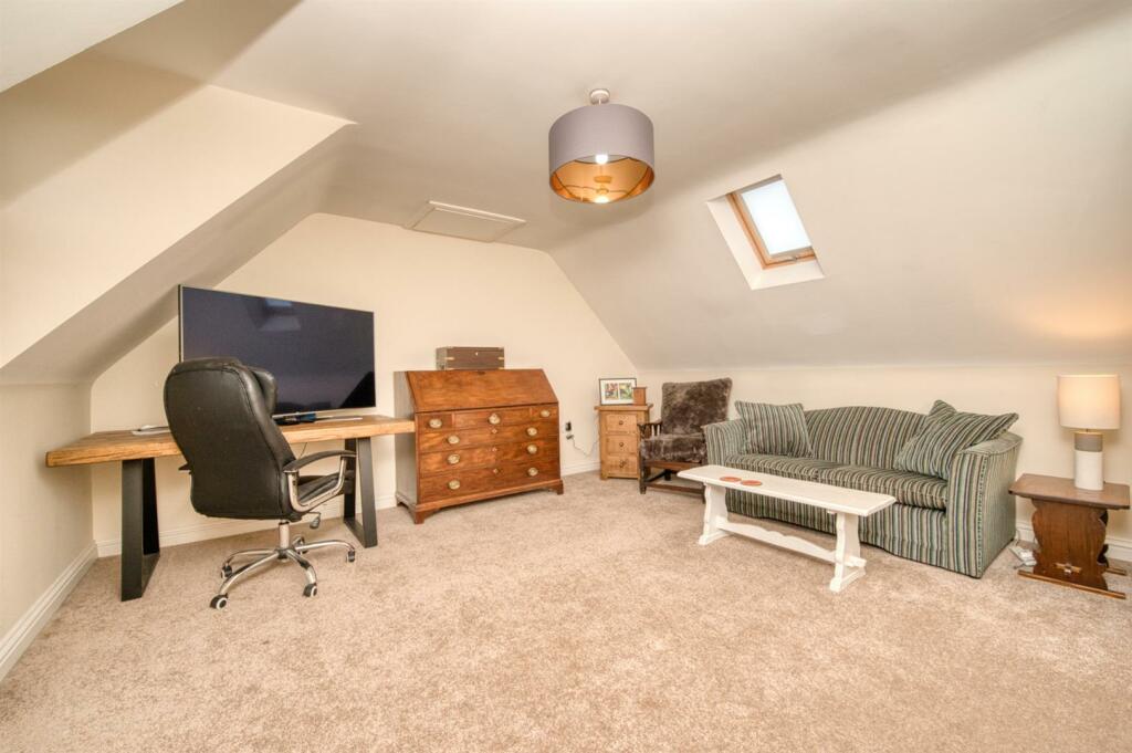 Bedroom Five - sofa and desk.jpg