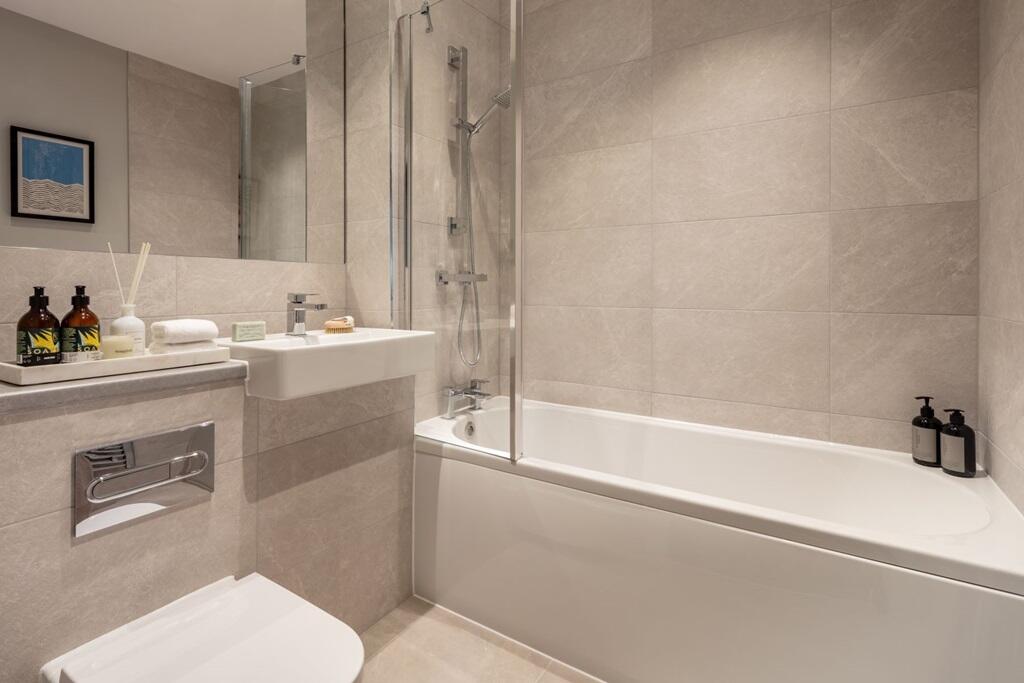 Take a long luxurious bathe or a quick shower in the easy to clean bathroom