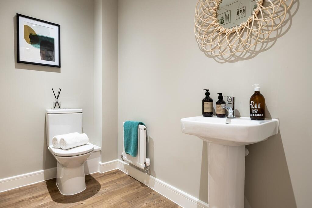 The downstairs cloakroom adds convenience