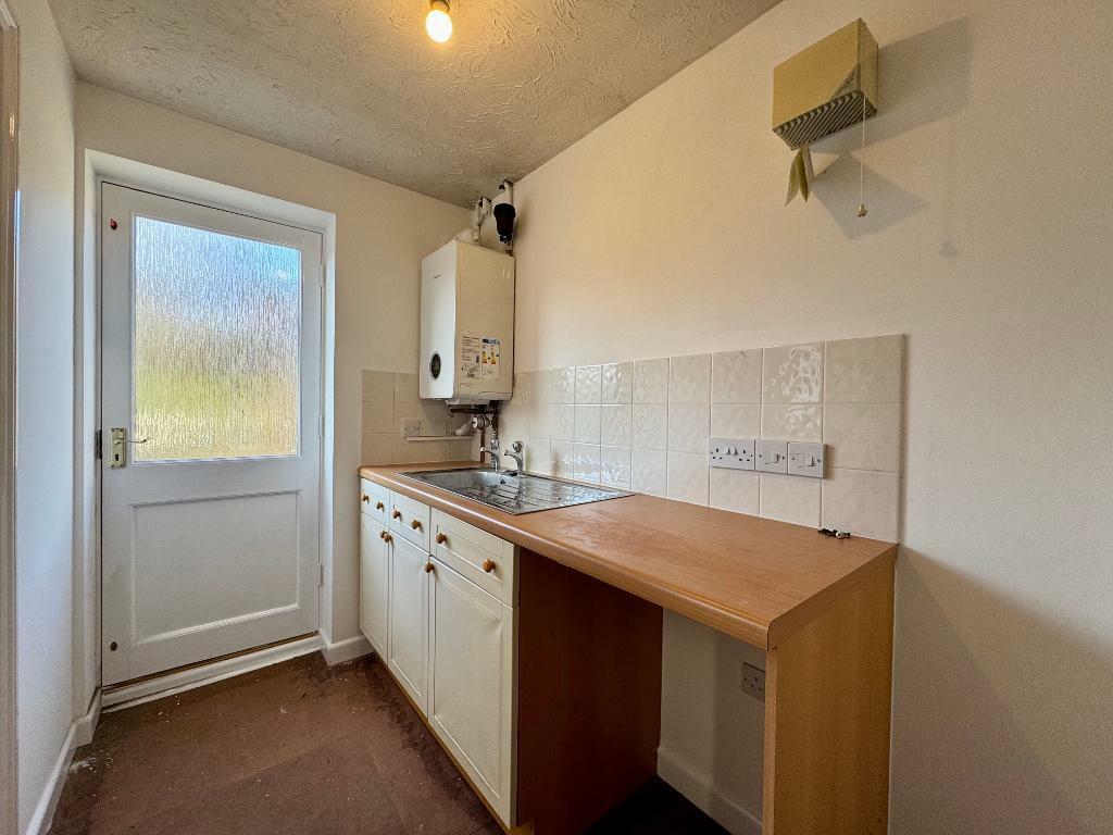 Utility room with boiler &amp; garden access