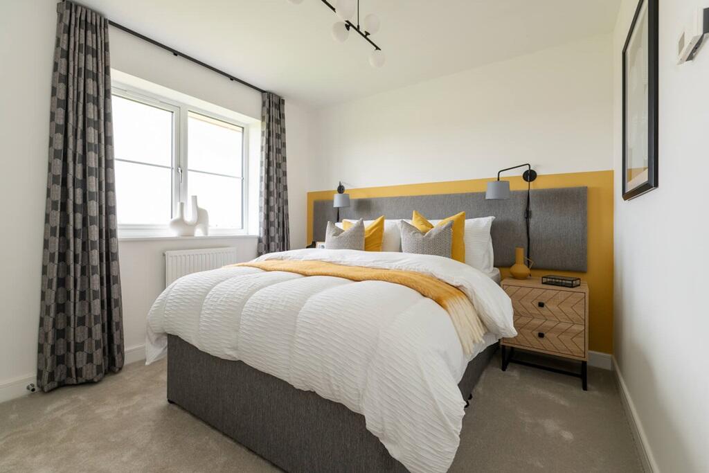 Bedroom one boasts an en suite shower room