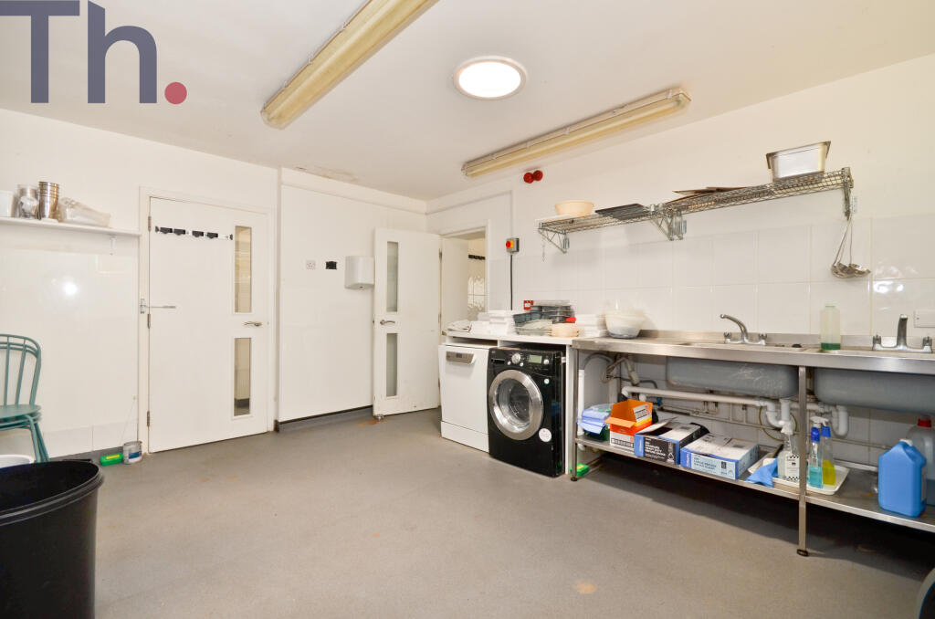 Outside Building with kitchen.JPG