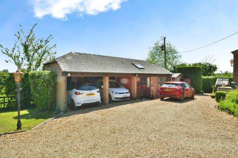 Driveway, covered parking, and The St...