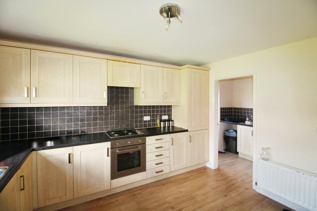 Kitchen through to utility