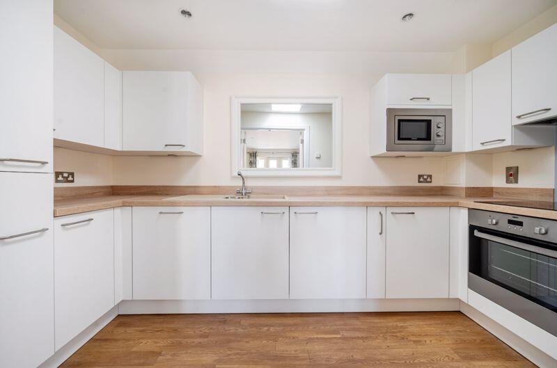 Kitchen with built-in appliances