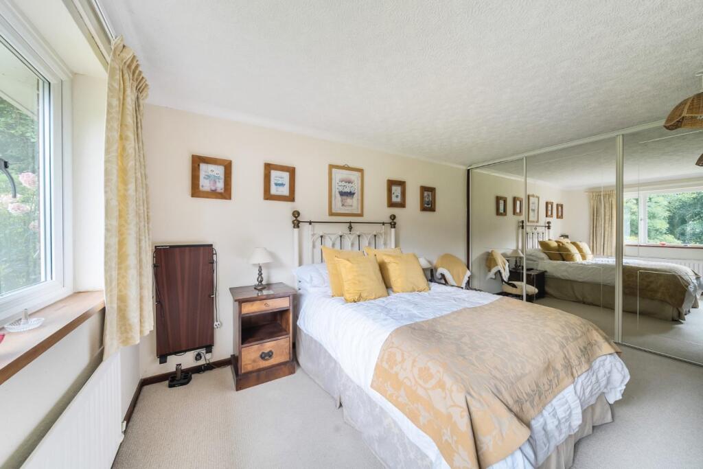 Bedroom 1 with wardrobes.jpg