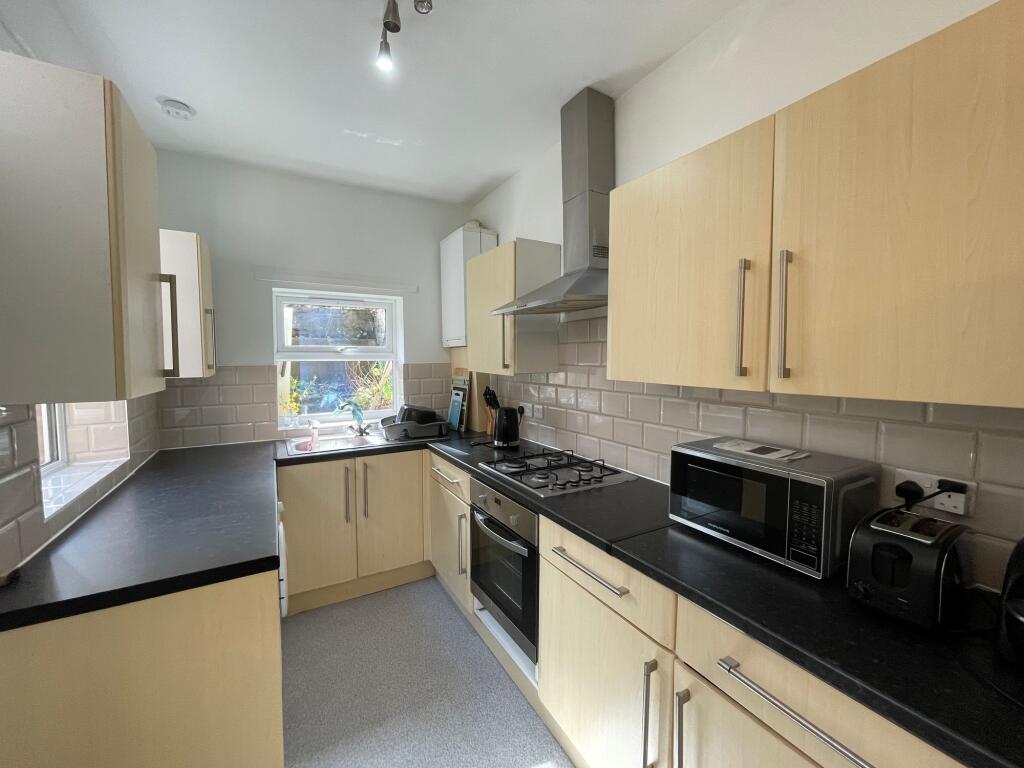 SITTING ROOM DINING ROOM AND KITCHEN