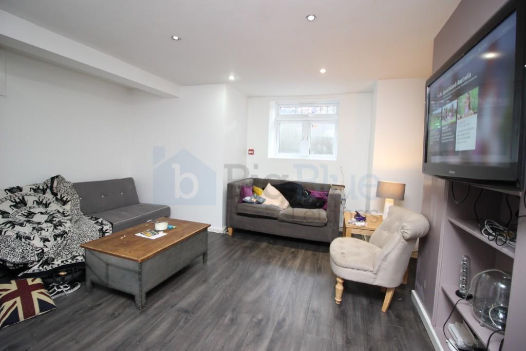 A cozy and modern living room featuring comfort...