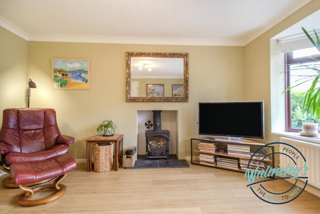 Front sitting room with log burner