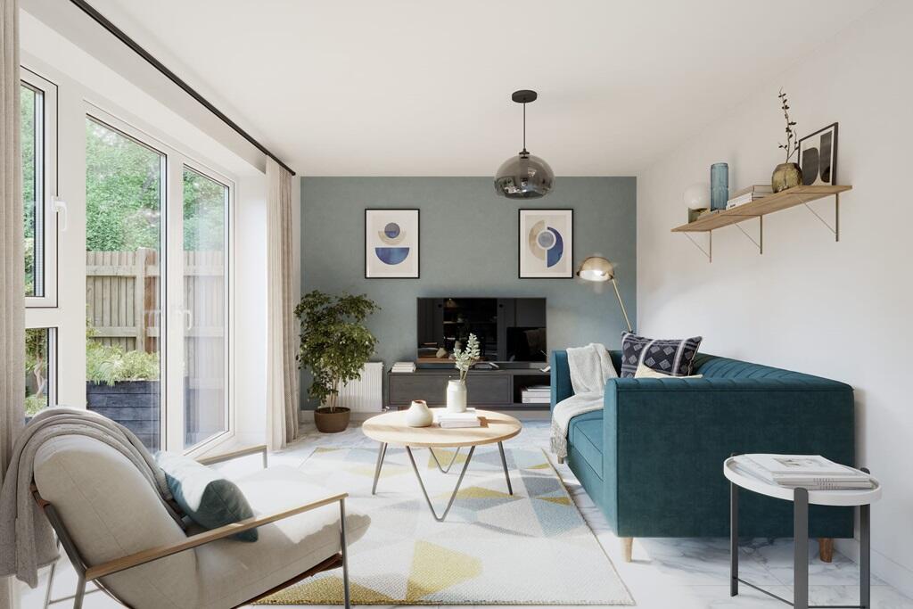 The cosy family room is located off the kitchen/dining area