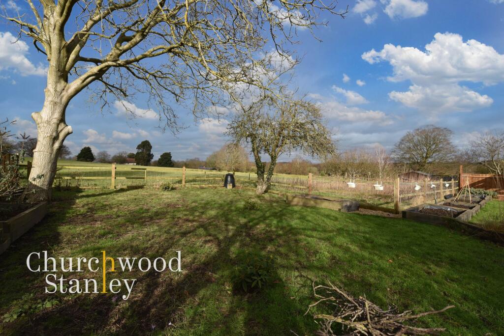 Rear garden and farmland beyond