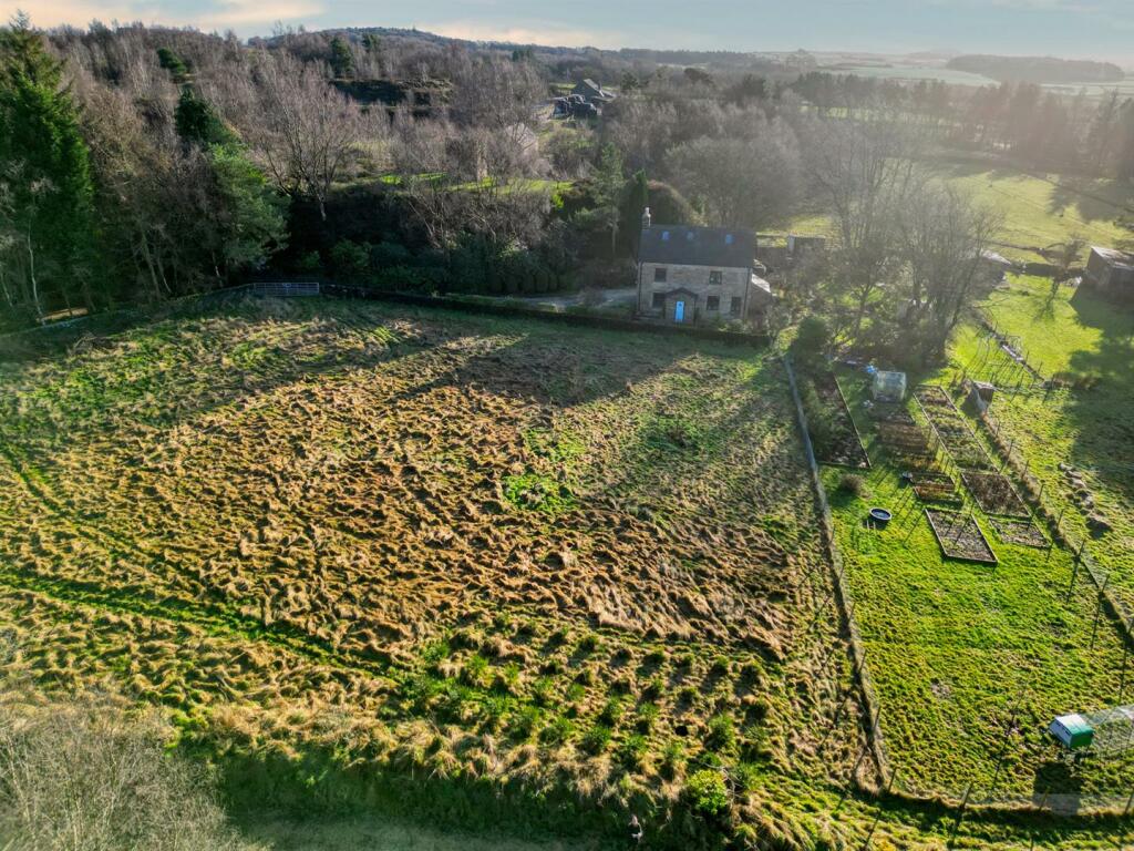 Front of the home and long view.jpg