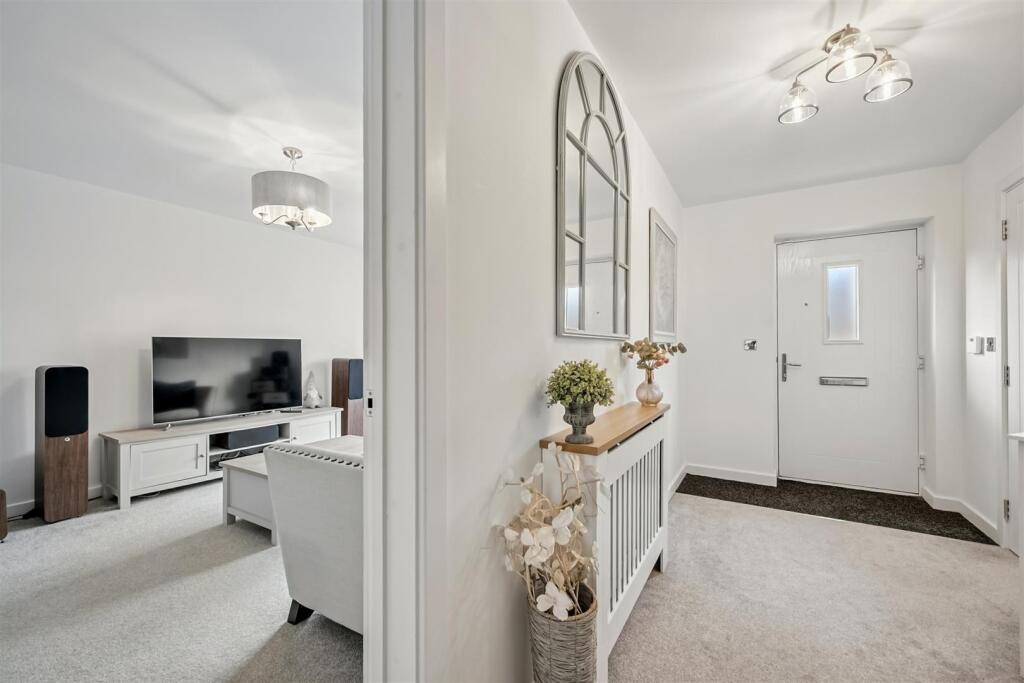 Entrance Hallway and Sitting Room.jpg