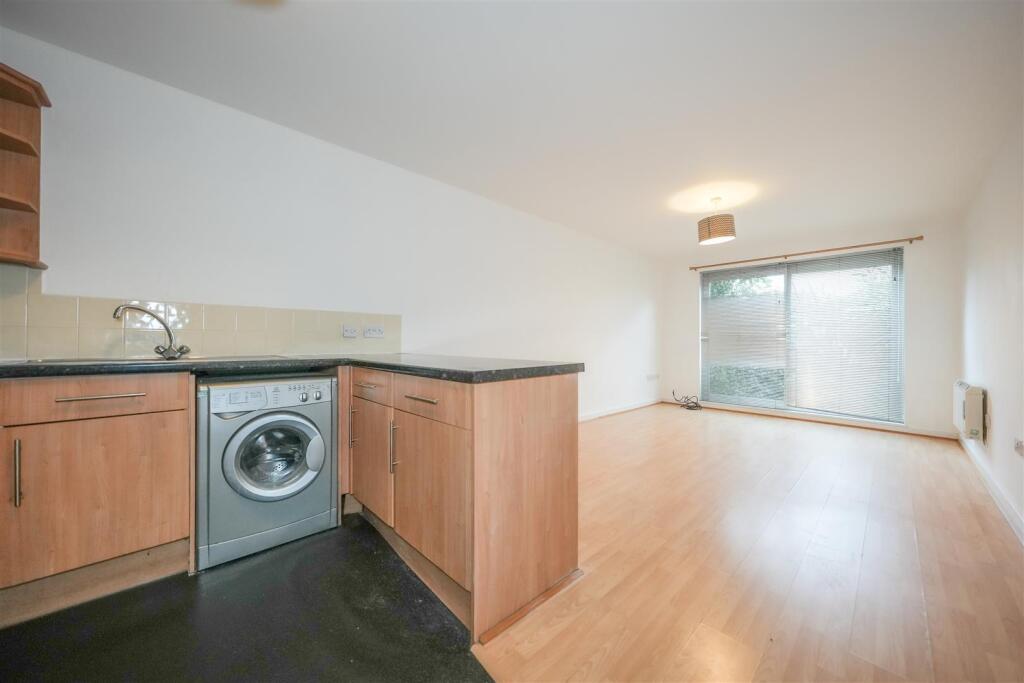OPEN PLAN LIVING ROOM/KITCHEN