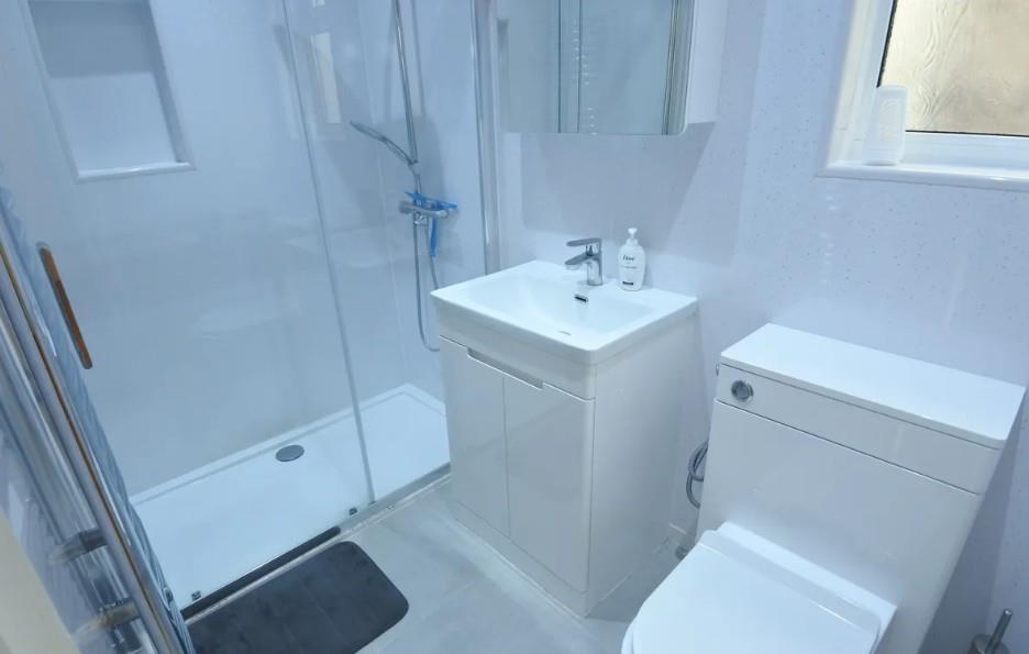 Modern fitted bathroom combined W.C