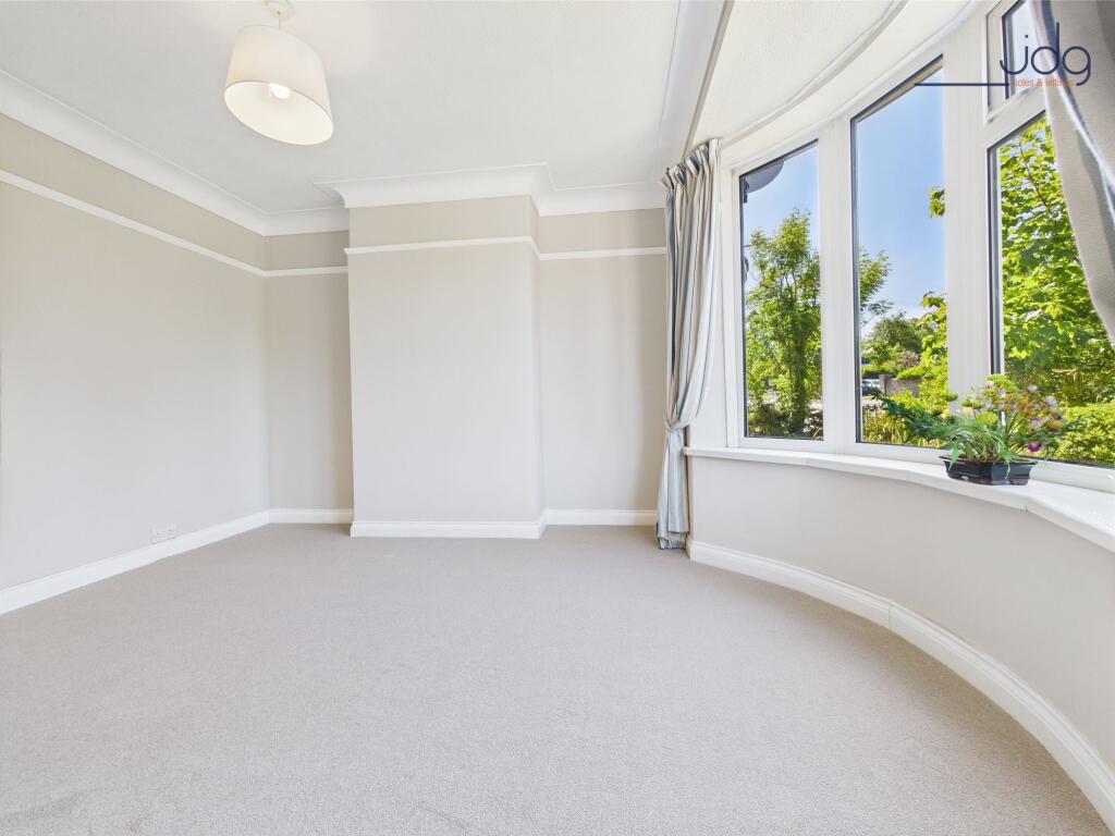 Bright and airy lounge with bay window