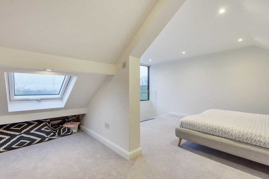 Bedroom with sitt...