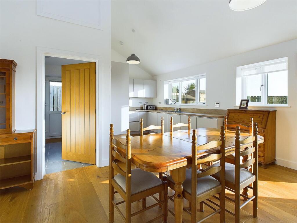 Dining and Kitchen.