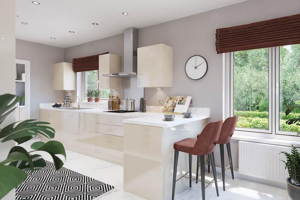 The kitchen offers lots of space for storage with space to cook, dine and entertain