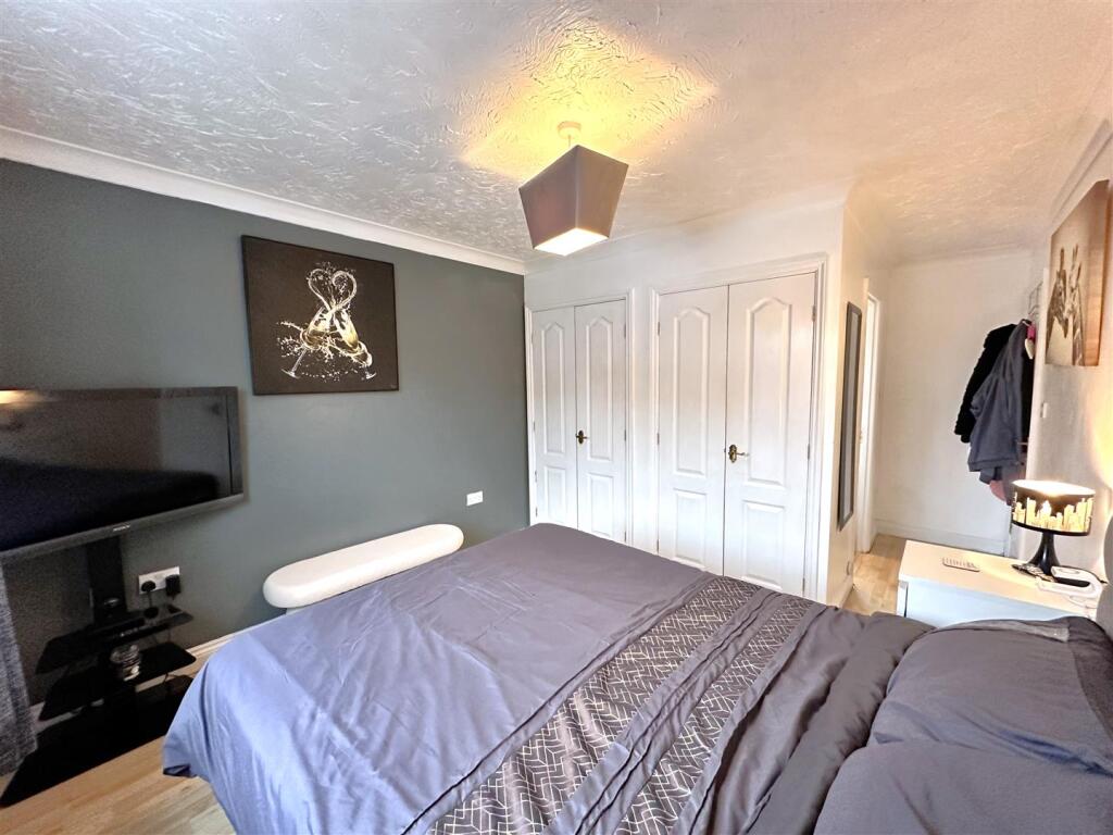 Bedroom One With Fitted Wardrobes 710