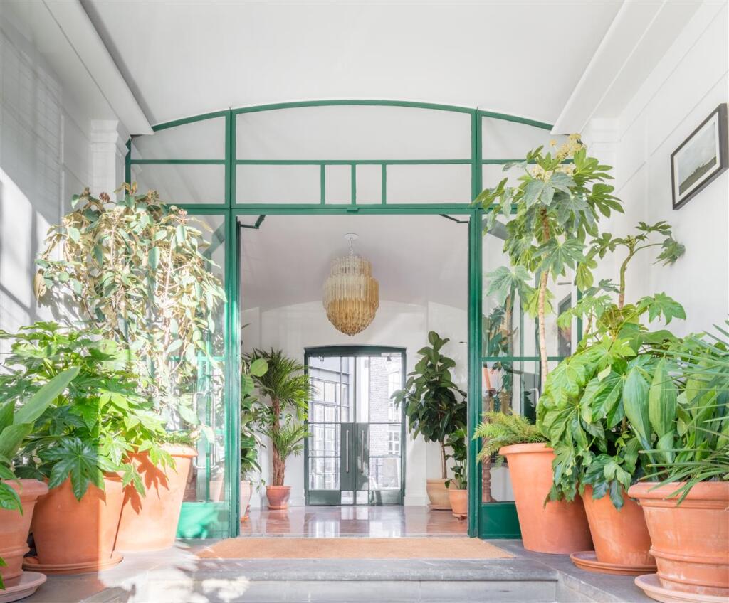 Plant-filled entrance hall