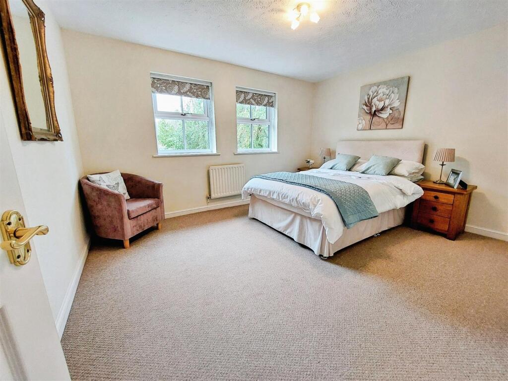 1cb333cb-Bedroom 202b.jpg