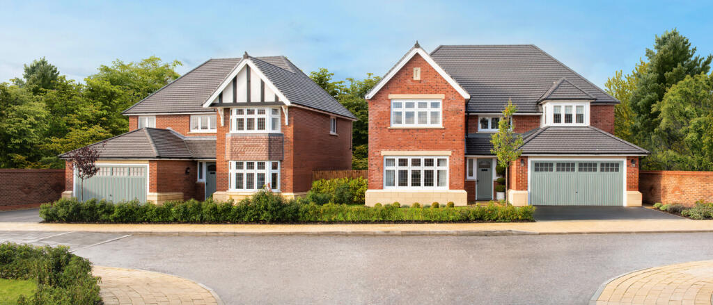 Two modern red-brick houses with grey tiled roofs and white window frames, surrounded by greenery on