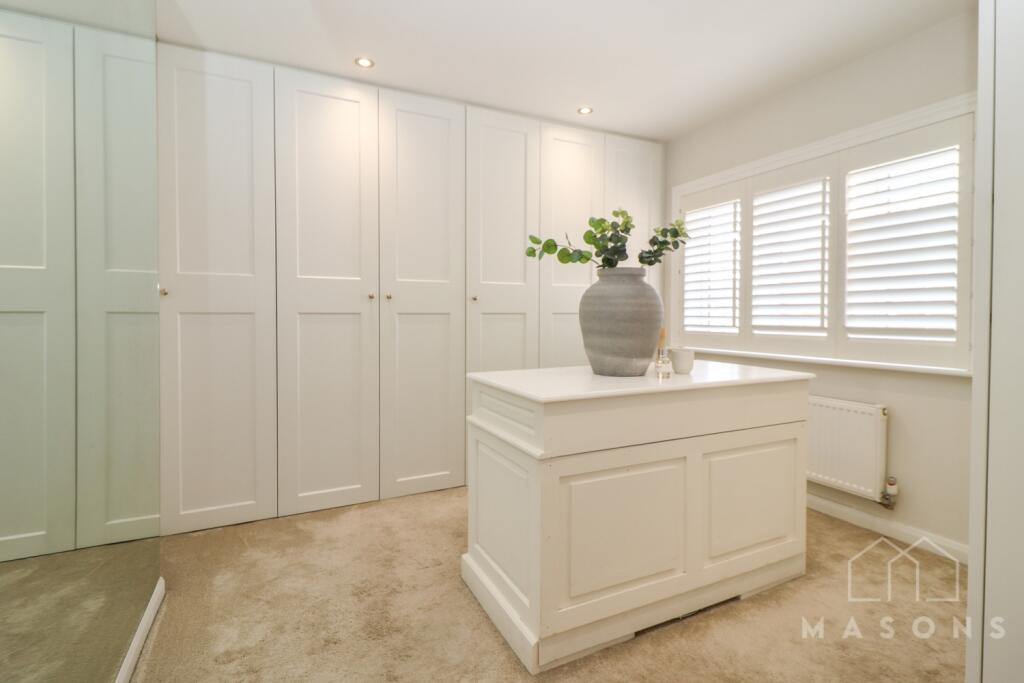 Bedroom two walk in wardrobe