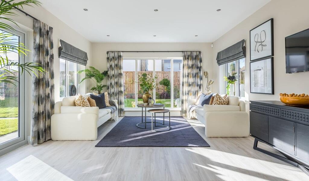 The tranquil garden room with French doors to the garden
